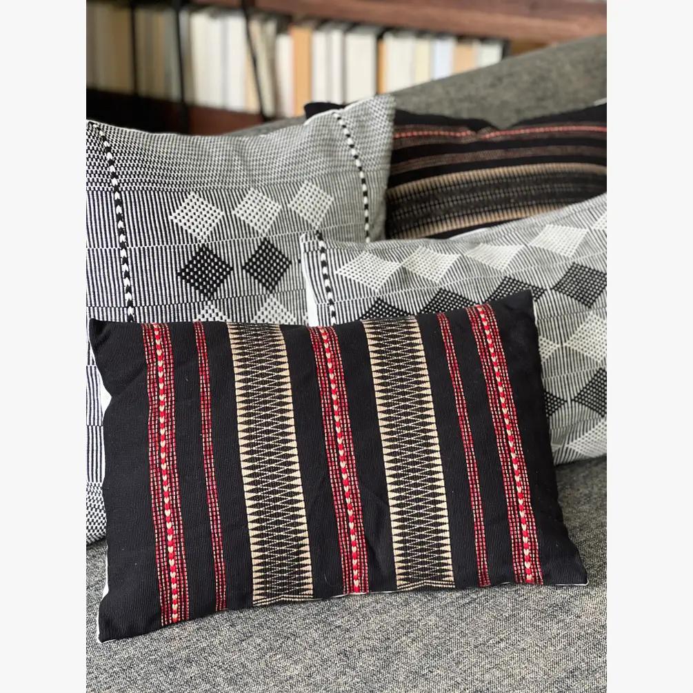 Collection of handwoven throw cushions.